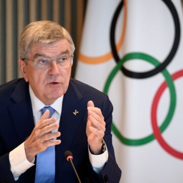 IOC president Bach coy as members call for rule change to extend his term