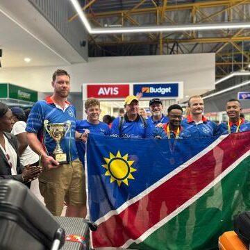 Indoor Hockey teams return home from Malaysia