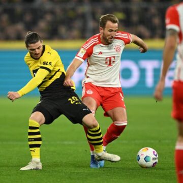 Kane hits hat-trick as Bayern thump Dortmund to keep pace with leaders Leverkusen