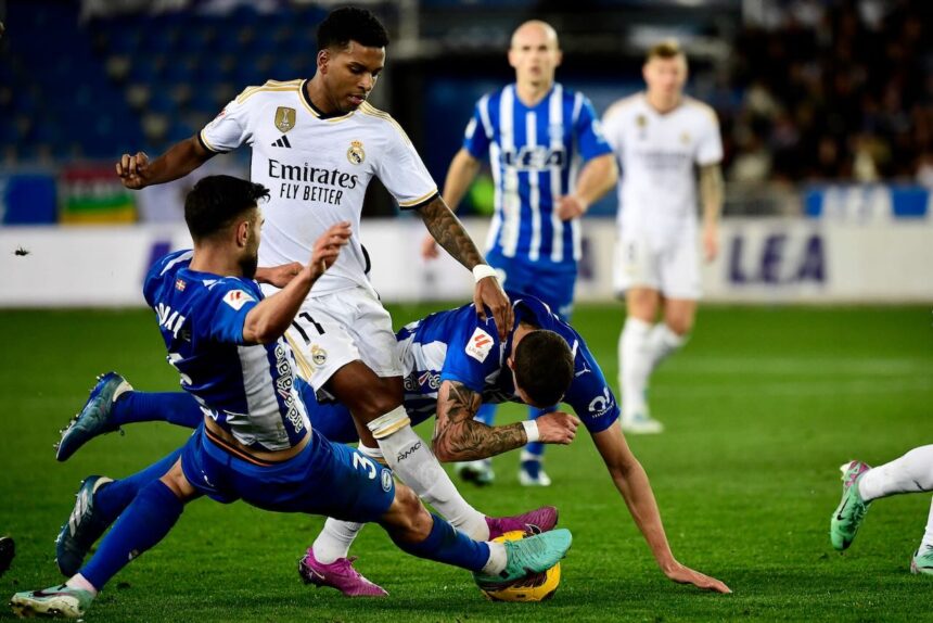 Vazquez sends Madrid to La Liga summit with late winner at Alaves