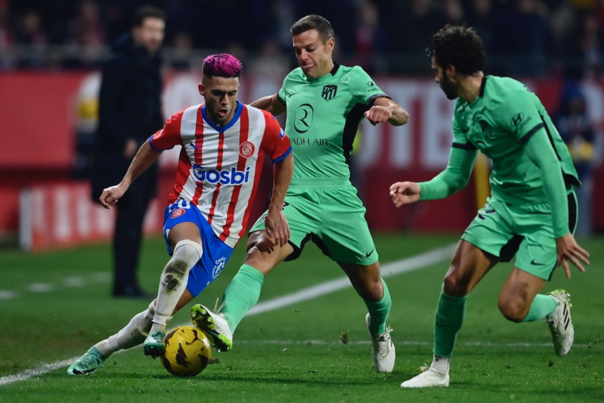 Girona edge Atletico thriller, stay level with Real Madrid