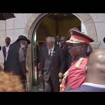 GEINGOB BURIAL | Dr. Nujoma and Pohamba participate in the ritual of tossing sand into the grave