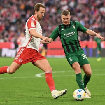 Kane scores to help Bayern keep pace with leaders Leverkusen