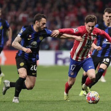 Atletico triumph on penalties to reach Champions League quarters